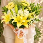 Premium European style bouquet with yellow lilies, white hydrangeas and seasonal flowers by FreshKnots Bangalore.