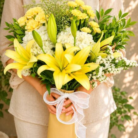 Premium European style bouquet with yellow lilies, white hydrangeas and seasonal flowers by FreshKnots Bangalore.