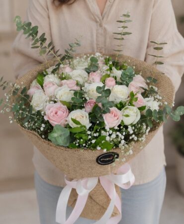 Premium pink and white rose bouquet with eucalyptus for online flower delivery in Bangalore.