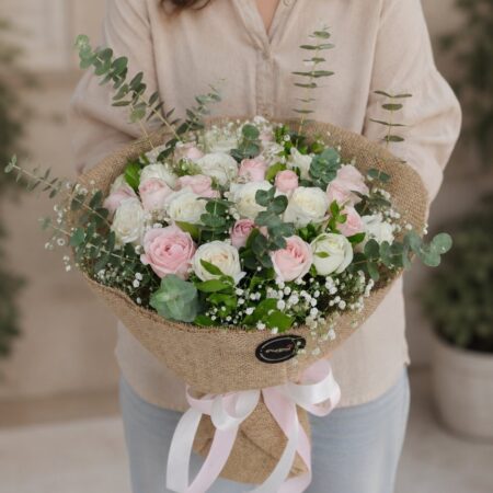 Premium pink and white rose bouquet with eucalyptus for online flower delivery in Bangalore.