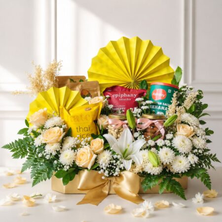 Luxury gourmet gift hamper with lilies, peach roses, healthy snacks and premium treats | Gift hamper delivery Bangalore | FreshKnots florist