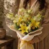 Premium yellow lily and white orchid bouquet for online flower delivery in Bangalore.