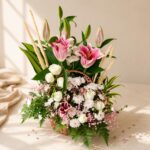 Close up of Willow and Bloom lily and rose basket arrangement, Bangalore flower delivery