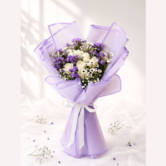 Premium bouquet of white roses, purple asters and baby's breath for same day flower delivery in Bangalore.