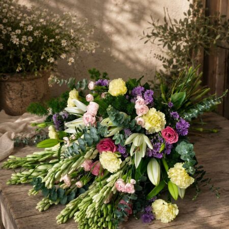 Giverny Claire European-style floral arrangement with lilies, carnations, chrysanthemums and eucalyptus