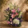 European-style flower basket with pink lilies, white hydrangeas, lisianthus and snapdragons for same-day flower delivery in Bangalore.