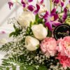 Close up of Joyful Blooms white roses and purple orchids, Bangalore flower delivery
