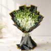 Noir and Ivory white orchid bouquet wrapped in black and gold, Bangalore