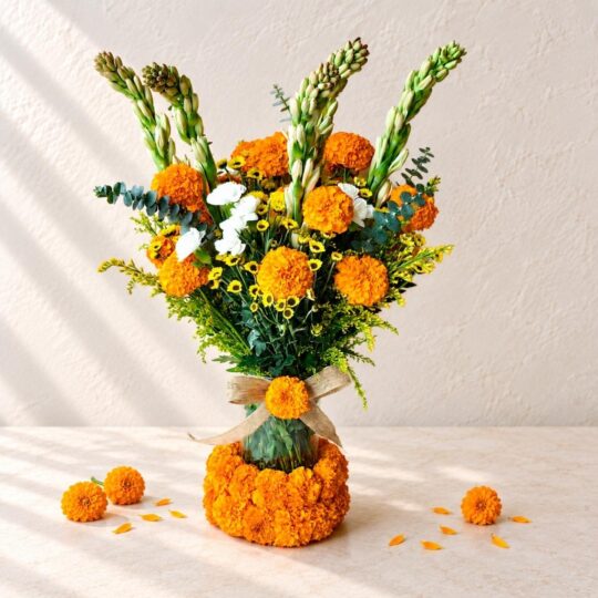 Diwali marigold centrepiece Bangalore - marigold and tuberose vase