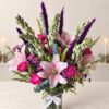 Pink lily and tuberose Diwali table vase, close-up Bangalore