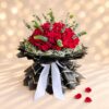 Crimson Crown 200 red roses bouquet in Bangalore with baby's breath, eucalyptus and black and gold wrapping