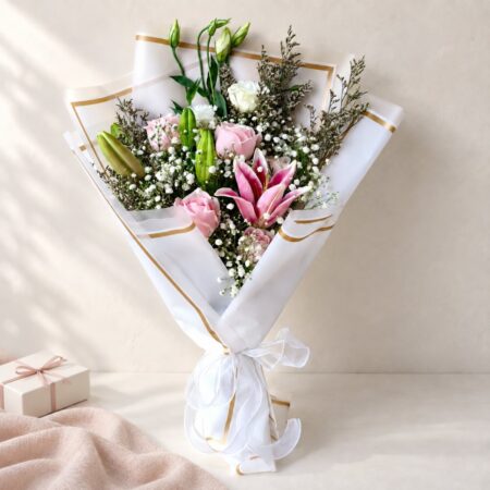Pink and Pearl lily rose bouquet, standing view Bangalore