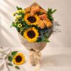 Sunflower mixed cut flowers bunch in burlap wrap, Bangalore