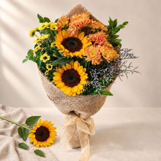 Sunflower mixed cut flowers bunch in burlap wrap, Bangalore