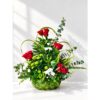 Red rose centrepiece in Bangalore with white spray carnations, green button chrysanthemums and eucalyptus in a handwoven coconut leaf basket