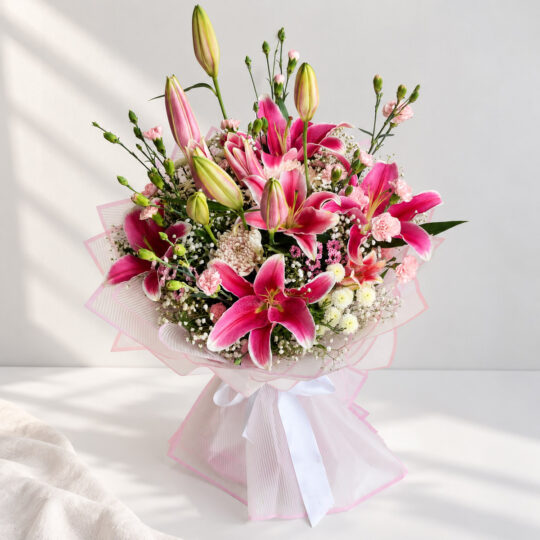 Pink oriental lily and carnation bouquet with white chrysanthemums, front close view