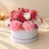 Candle flower box in Bangalore with pink and white peony candles and dried baby's breath in a white box