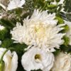 White disbud chrysanthemum with eustoma and spray carnations, close-up