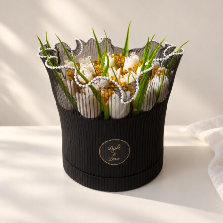Tulip candle bouquet in Bangalore with white tulip candles and dried mustard baby's breath in a black hat box