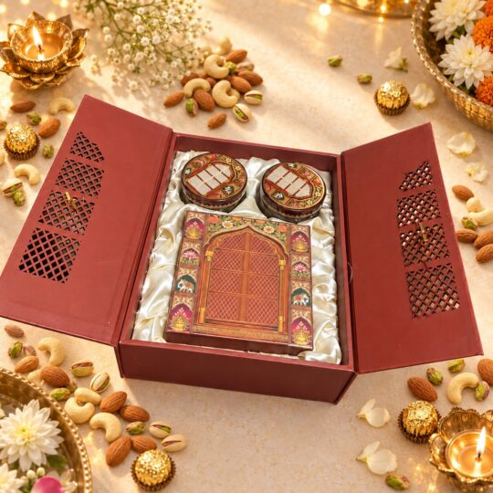Open jharokha gift box with jaali-cut doors, two printed dry fruit jars and a matching jharokha-print inner box on satin