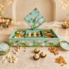 Mint & Gold Diwali dry fruits and chocolates box in Bangalore with pistachios, cashews, almonds, golden raisins and Ferrero Rocher in a lotus-print tray