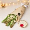 Tuberose Diwali gift combo in Bangalore with 10 fragrant tuberose stems in kraft paper and a scented urli candle