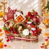 Diwali gift basket in Bangalore with Ferrero Rocher, almonds, cashews, scented candles and gold candle holders in a rope basket
