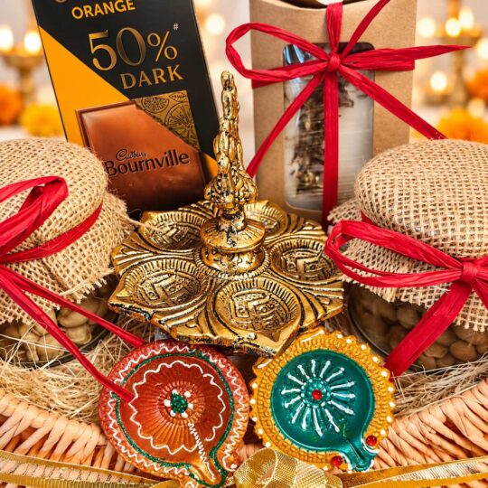 Cadbury Bournville dark chocolate and burlap-covered dry fruit jar in the Panchdeep Diwali hamper, side close-up